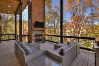 Modern 4BR Cabin w easy access, hot tub & a view!