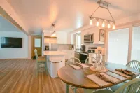 Ride your ATVs and snowmobiles directly from the house!