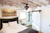 House on the lake with a large sandy beach just steps from the back door.