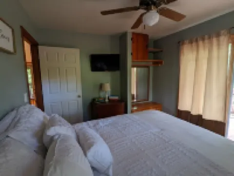 Cozy cabin with wrap around porch and only minutes to town!