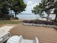 NEW! Renovated lakeside cottage with a private sandy beach. Great Location!