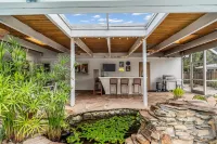 Family friendly Siesta Key home with heated pool. 5 minutes drive to beach.
