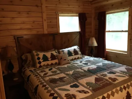 Small log cabin in the woods