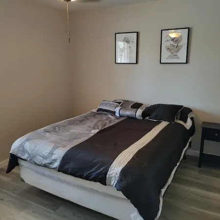 Centrally located close to everything with private entry and private yard.