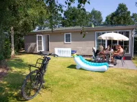 Luxurious lodge with airco, located beside a lake Отели в г. 