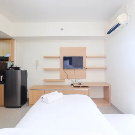 Cozy Minimalist Studio @ Taman Melati Margonda Apartment by Travelio