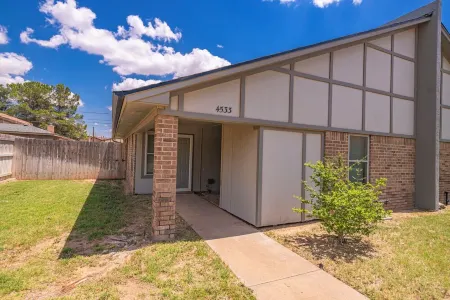 Right at Home-Uptown Place with gated yard and covered parking