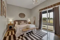 Outdoor Patio and Inviting Hot Tub - Charming Cottage Retreat