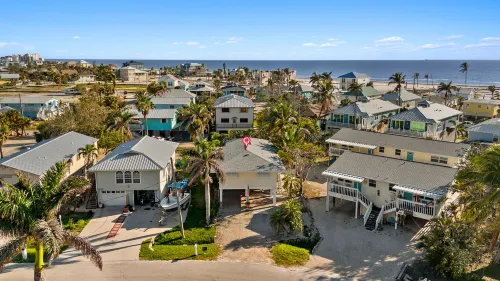 Stylish Outdoor Shower and Modern Kitchen - Cozy Beach Retreat