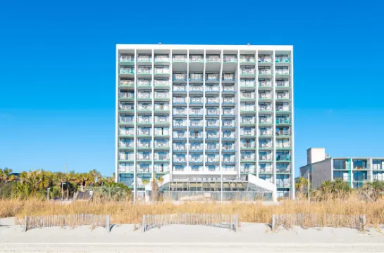 Oceanfront Views and Pool Access - Stylish Coastal Retreat