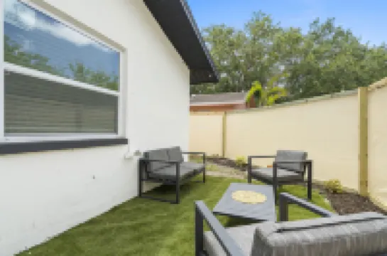 Stylish Duplex with Fenced Backyard and BBQ Grill - Tranquil Escape