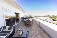 A spacious, light-filled home, a stone's throw from the water
