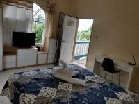 Arms of Charms Guesthouse Hotéis em 