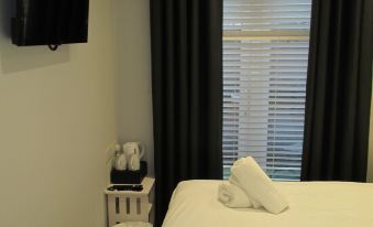 Rooms at the Ritz Complex