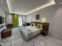 Loutsiana Deluxe Apts Hotels near Landa Beach