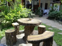Hidden Garden Pension Hotels near El NIDO harbour - Cadlao Island view