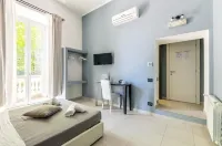 Merulana 139 Suites Отели в г. 
