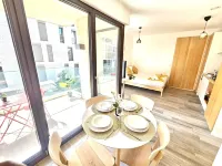 Cozy studio with sunny terrace Hotel di 