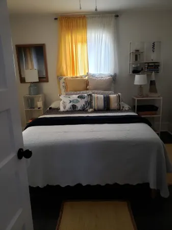 Charming 2-bedroom vintage cottage with WiFi, a/c, and other popular amenities.