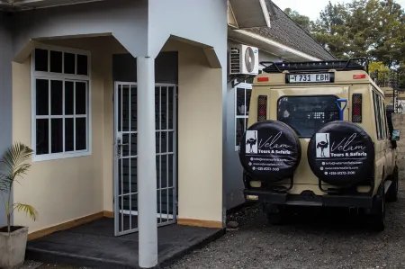 Velam Home Stay Отели в г. Аруша