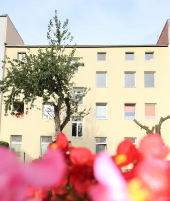 Ferienwohnung im Zentrum mit Gartennutzung