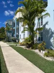 Relax at Bahía Real – Poolside Balcony Escape