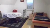 Attic apartment with open entablature