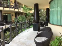 Oceanfront condo on the beach w/ hot tub! Minutes walk to restaurants and bars!