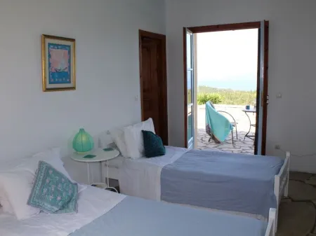 Exceptional sea views from this delightful villa nestled into the hillside.