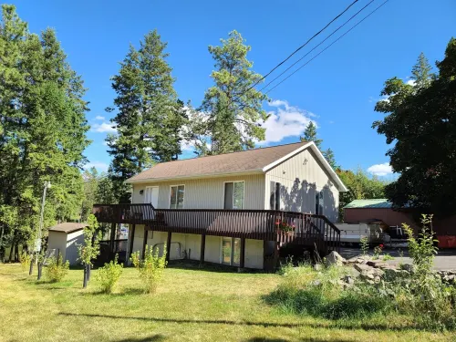 Flathead Lake home W/ private beach, dock, and hot tub