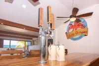 Stay at the famous Jolly Octopus Beach Bar! Beach Front with Water toys included