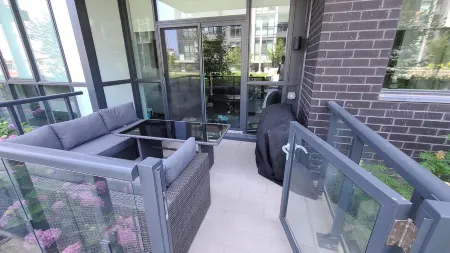 Cozy Lake Simcoe 2 bedroom condo with a garden walkout to the boardwalk/ Pier.