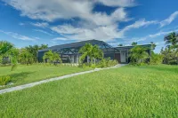 Poolside Oasis w/ Boat Dock! Cape Coral Retreat - parking