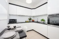 시티 센터의 주차장 있는 루미나 아파트  호텔