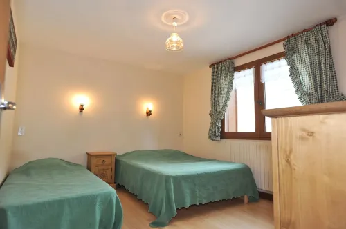 8O M2 apartment in a chalet of 3 apartments, semi-detachable Hotels in Notre-Dame-de-Bellecombe