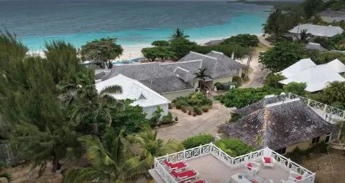 Beach villa staffed daily.