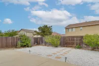 7 Mi to Lake Yosemite: Family Home w/ Fenced Yard - 2-Star