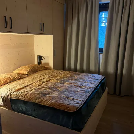 Bormio Apartments al pradais  giardino est Отели в г. Бормио