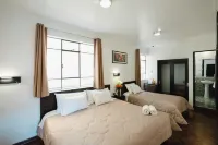 Hostal & Apartments El Triunfo - Homestays