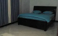 Comfy Room at Honey Guesthouse Syariah Hotels in Slawi