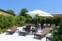 Joia Hotel & Luxury Apartments Hôtels à : Brusaporto
