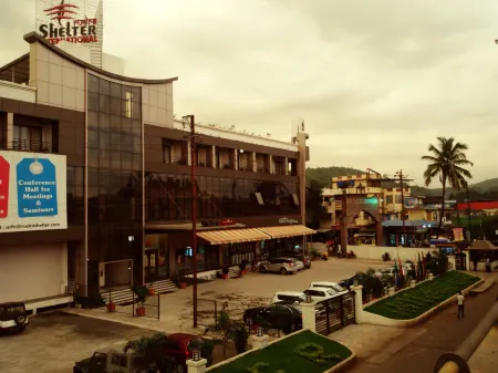 Rudra Shelter International Hotel Отели рядом с достопримечательностью «Васай Форт»