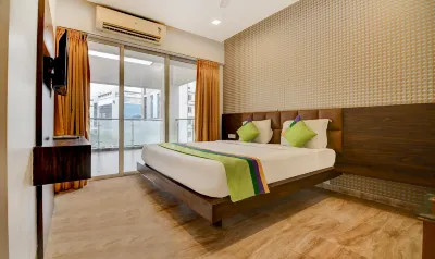 Treebo Kuval Inn Hotels near Phoenix Mall of the Millennium