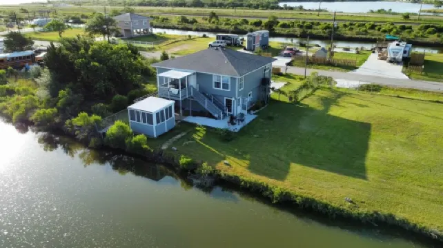 Charming tuck away waterfront home