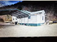 Spacious riding retreat 4 BR Outlaw House/ ATV Riding 10beds-Large Parking