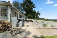 The Beach Retreat is a cozy beach Villa with Hottub overlooking a private beach.