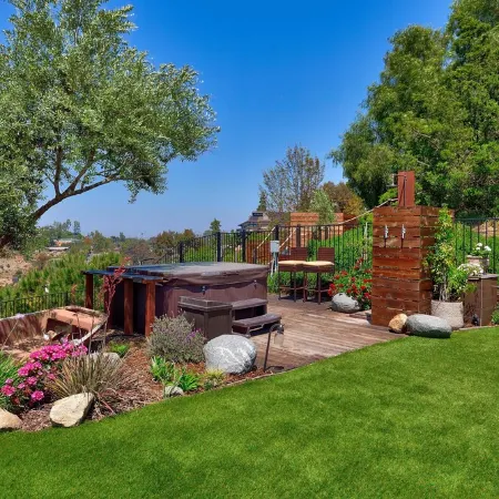 A private oasis to relax and play in the comfort of a gated 2-acre estate.