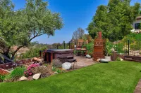A private oasis to relax and play in the comfort of a gated 2-acre estate.