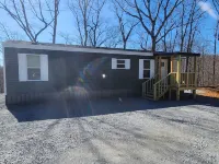 Cozy cottage w/1 bedroom, WiFi, AC in tranquil Springville close to boat ramps