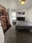 "Prime Location Stylish 1Bedroom  with Hot Tub Access, across street from Legion